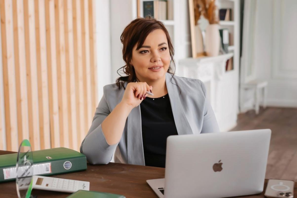 Students collaborating on video project during hands-on workshop